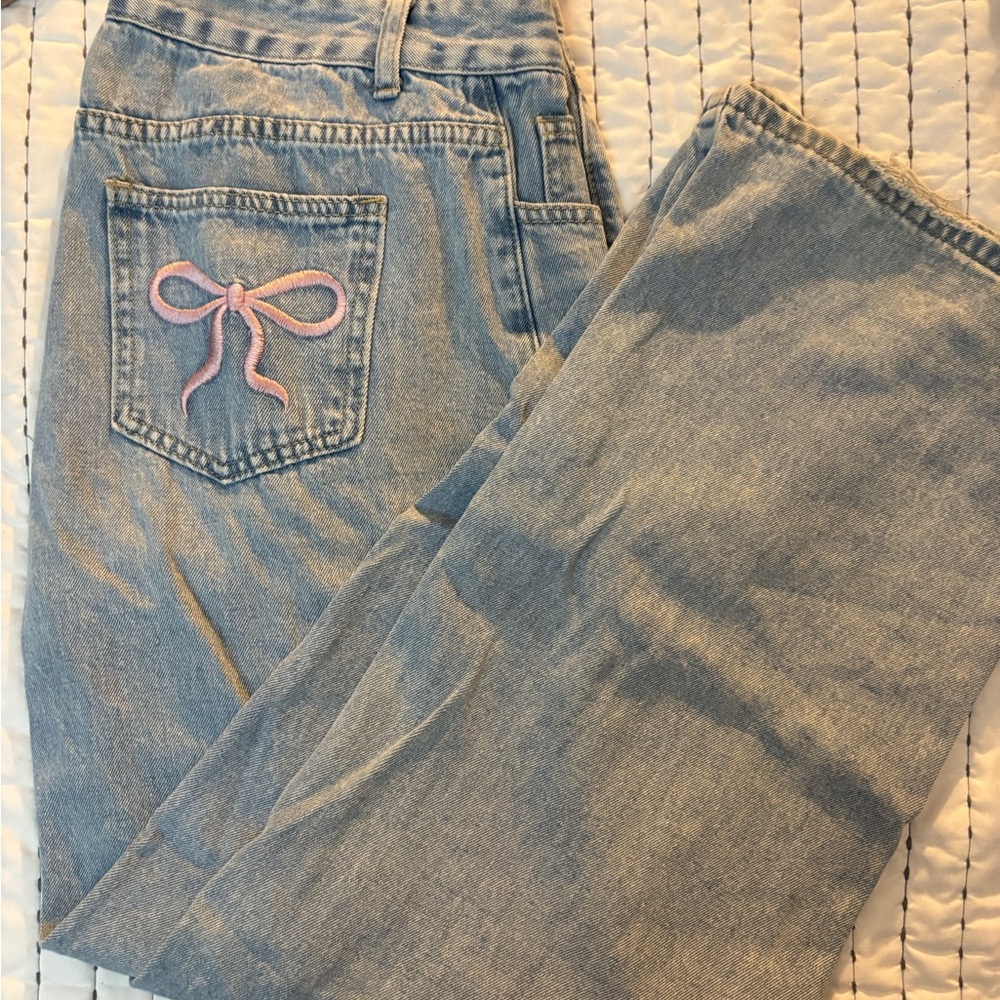 Edikted Light Blue Jeans with Pink Bow Accent